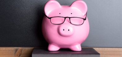 bigstock-Piggy-Bank-With-Eye-Glasses-On-80307374.jpg